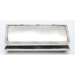 A rectangular silver trinket box, Chester 1922, with hinged cover, 10.5 x 4.5 x 2.5cm, 83gms