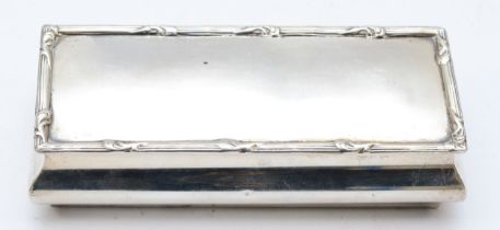 A rectangular silver trinket box, Chester 1922, with hinged cover, 10.5 x 4.5 x 2.5cm, 83gms