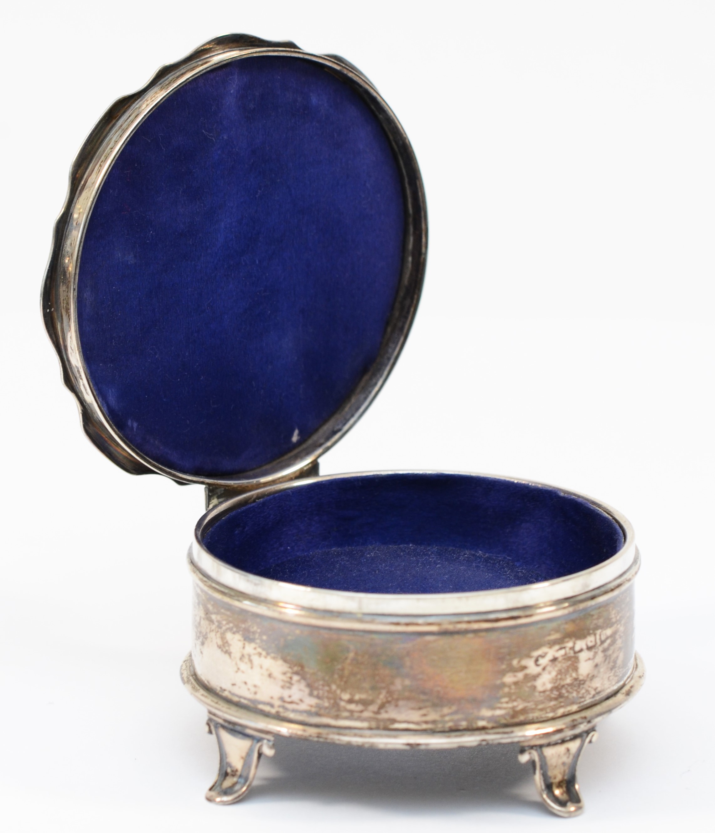 A silver trinket box, marks worn, Birmingham 1919?, hinged lid, raised on four legs, diameter 8cm - Image 2 of 2