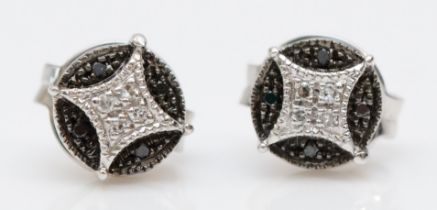 A 9ct white gold black and white diamond ear studs, 1.3gm