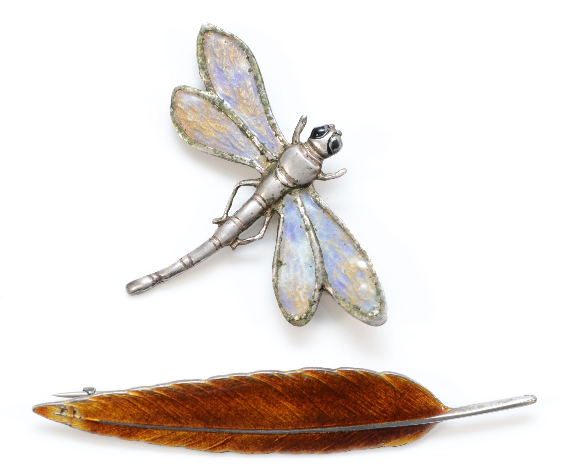 A silver and enamel dragonfly brooch, 54 x 41mm and a silver and enamel leaf brooch, 14gm