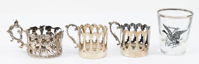 A silver tea glass holder, by Mappin & Webb, Sheffield 1897, with cherub decoration and two plain