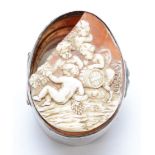 An unmarked silver oval box, with broken shell cameo hinged cover, 5.5 x 4 x 3cm, 47gms