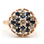 A 9ct gold sapphire and diamond cluster ring, K 1/2, 2.3gm