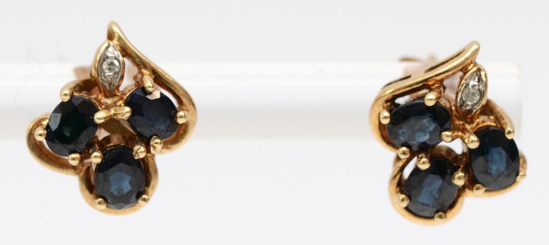 A 9ct gold pair of sapphire and diamond ear studs, 11mm, 2.1gm