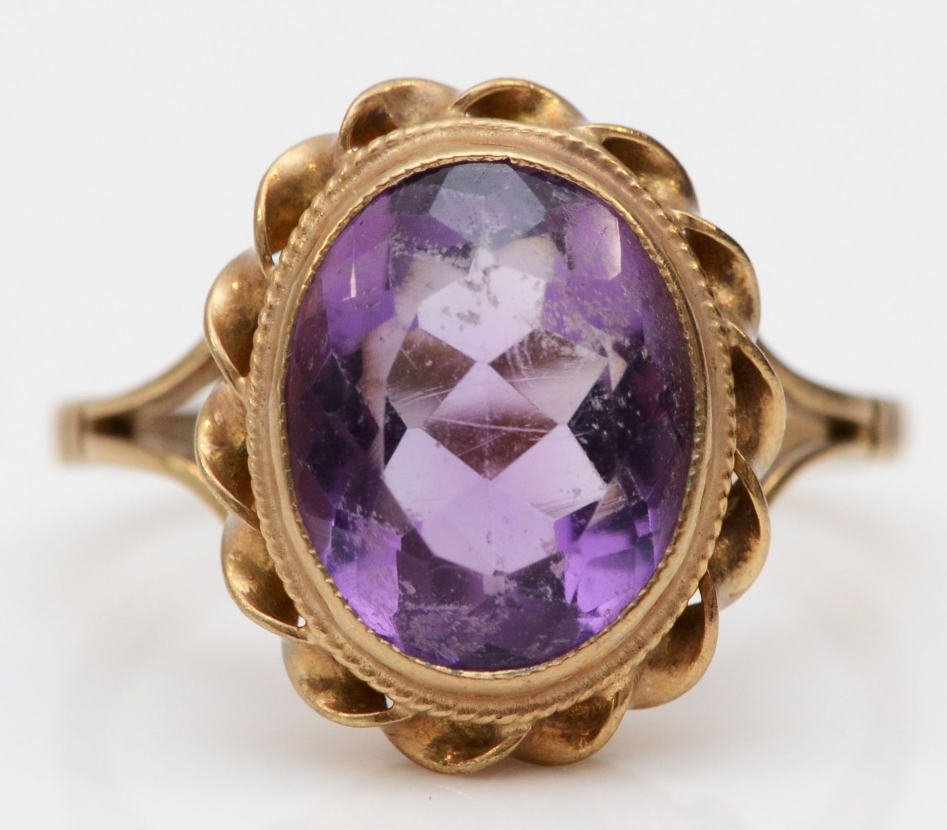 A vintage 9ct gold and amethyst dress ring, stone 12 x 10mm, O, 3.6gm