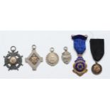 Five silver watch fobs and a silver gilt and enamel Rotary International badge, 76gms