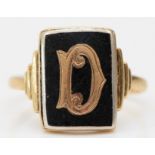 A vintage 9ct gold and onyx panel ring, inset letter D, T 1/2, 4.3gm