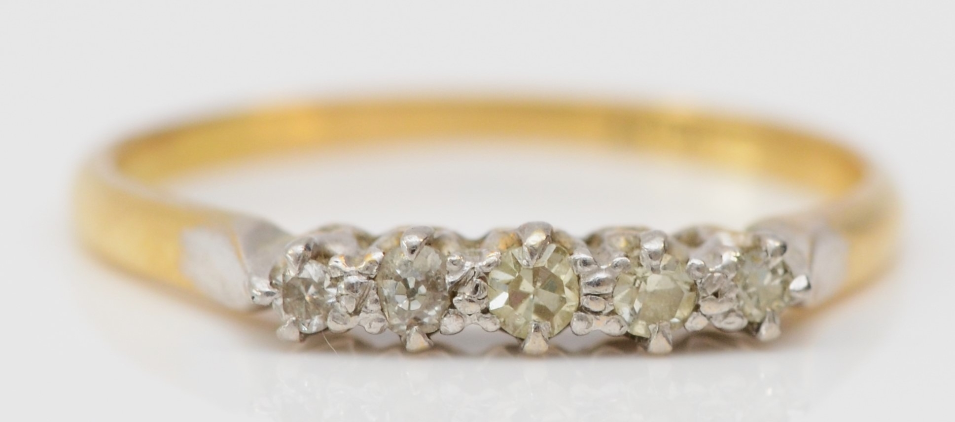 An 18ct gold five stone single cut diamond ring, S, 2.5gm