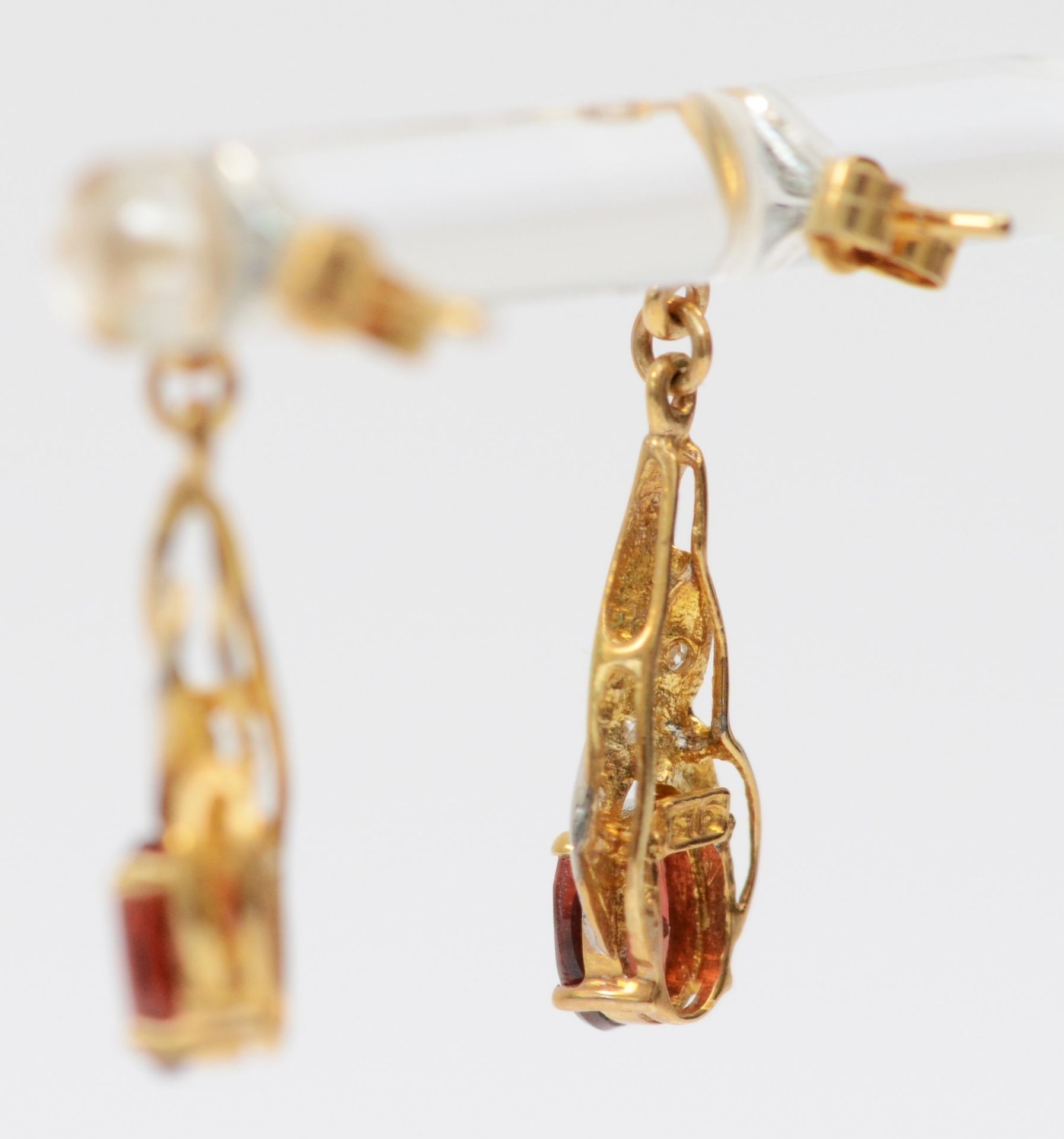 A 9ct gold pair of diamond and garnet ear pendants, 20mm, 1.7gm - Image 2 of 2