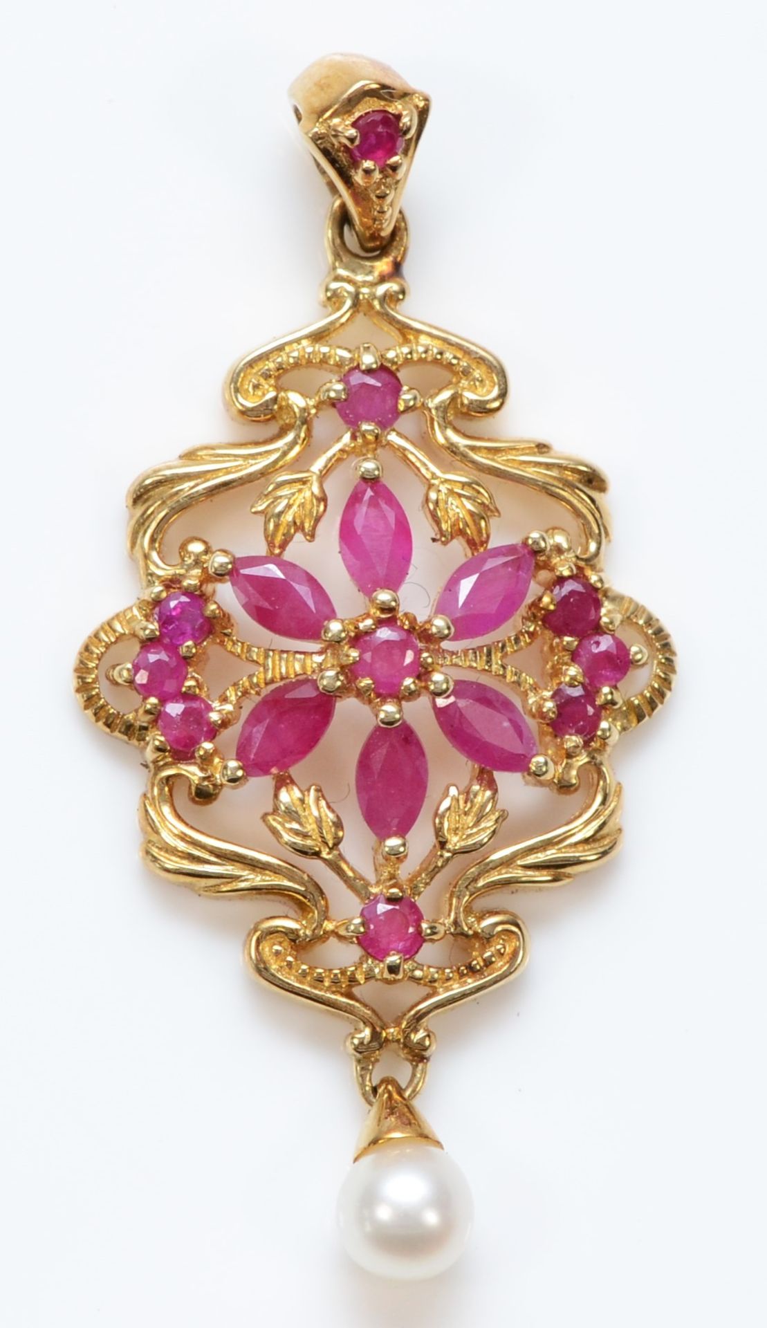 A 9ct gold ruby and cultured pearl openwork pendant, 36mm, 3.1gm