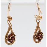 A 9ct gold pair of garnet cluster ear rings, 2.1gm