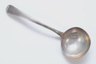 A George III silver bottom marked feather edge ladle, lion passant only, 17.5cm, 42gm