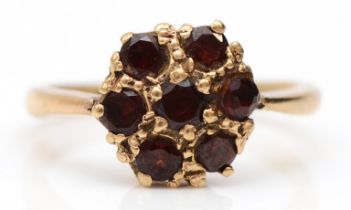 A 9ct gold and garnet cluster ring, J, 2gm