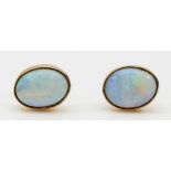 A 9ct gold pair of opal ear studs, 1.3gm, probably doublets