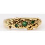 A 9ct gold gold Edwardian style emerald and brilliant cut diamond five stone ring, O 1/2, 2.7gm