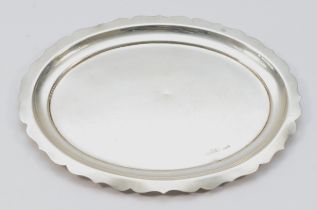 A silver oval dish/stand, Chester 1931, with wavy border, 17 x 13.5cm, 123gms