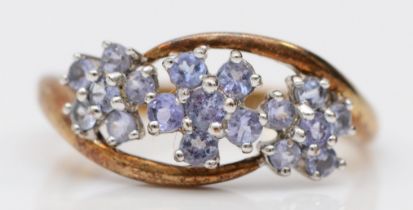 A 9ct gold and tanzanite triple cluster ring, N, 2.2gm