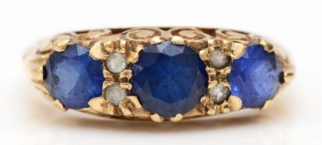 A vintage 9ct gold blue and white stone ring, carved claw set, J, 3.2gm