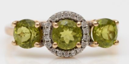 A 9ct gold peridot and white gemstone ring, N 1/2, 2.2gm