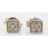 An 18ct white gold pair of brilliant cut diamond ear studs, each with five stones, 1.6gm