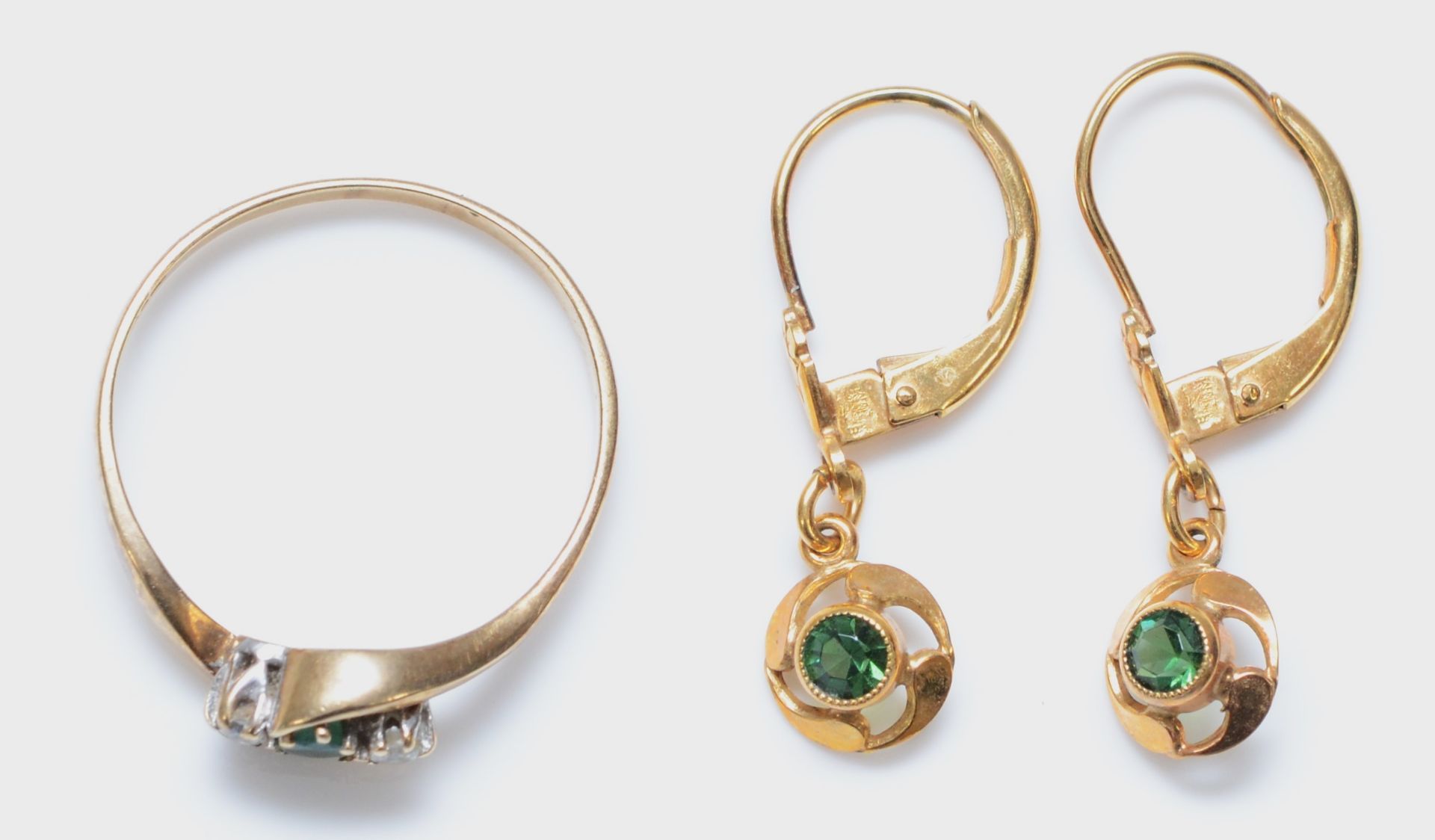 A 9ct gold emerald and diamond three stone ring, P, 1.5gms and a pair of rolled gold ear rings. - Image 2 of 3