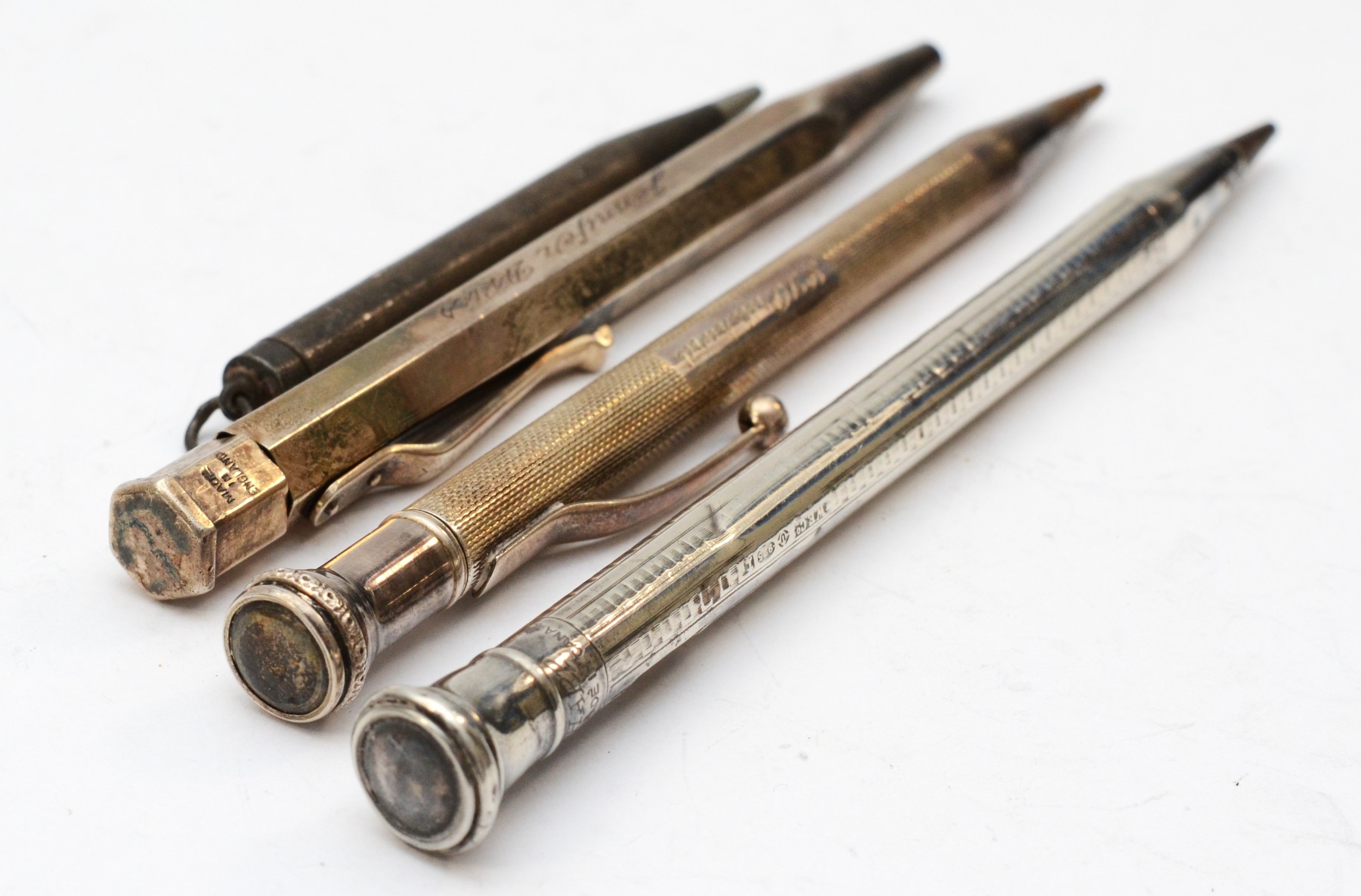 Four sterling silver and English assayed silver propelling pencils. - Image 2 of 2