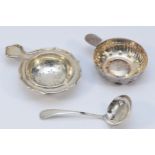 A silver tea strainer, London 1955, a silver sauce ladle, Sheffield 1965, 48gms and an electroplated