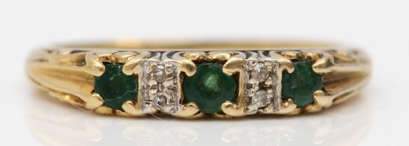 A vintage 9ct gold emerald and diamond five stone ring, L, 1.9gm