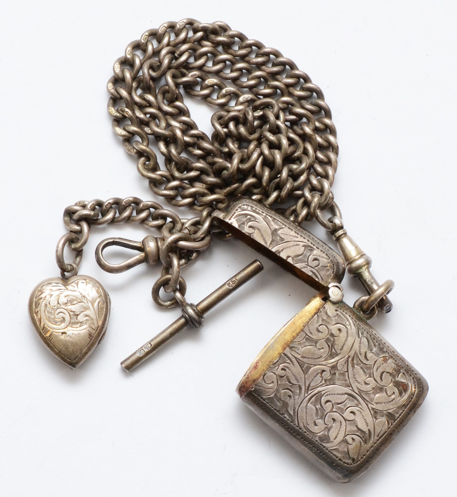 A silver uniform curb link watch chain, Chester 1908, 47cm, with a silver heart shape locket - Image 2 of 2