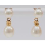 A 14K gold mounted pair of cultured pearl ear drops, 19mm