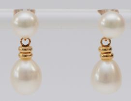 A 14K gold mounted pair of cultured pearl ear drops, 19mm