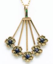 A 9ct gold and sapphire pendant, chain, 2.1gm