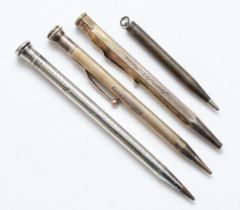Four sterling silver and English assayed silver propelling pencils.