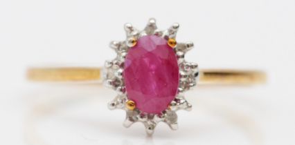 A 9ct gold ruby and diamond cluster ring, O, 1.5gm
