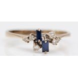 An 18ct white gold brilliant cut diamond and baguette sapphire dress ring, S, 2.7gm