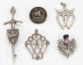 Robert Allison, a Scottish silver thistle brooch, Glasgow 1953 and a Viking sword and shield brooch,