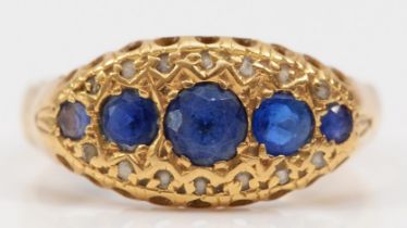 An Edwardian 18ct gold sapphire and diamond chip boat shape ring, later stamped 18ct, probably a