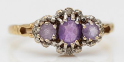 A 9ct gold amethyst and diamond cluster ring, N 1/2, 1.6gm