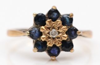 A 9ct gold sapphire and diamond cluster ring, O, 2.4gm