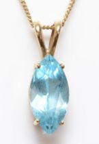 A 9ct gold and topaz pendant, stone 14 x 7mm, chain, 3gm