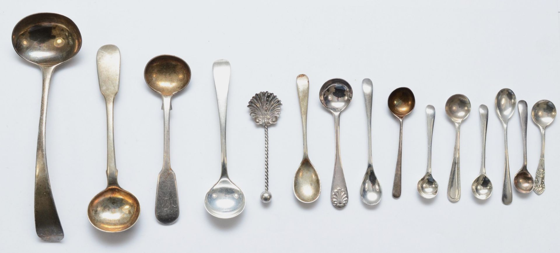 A collection of Georgian and later silver condiment spoons, 99gms