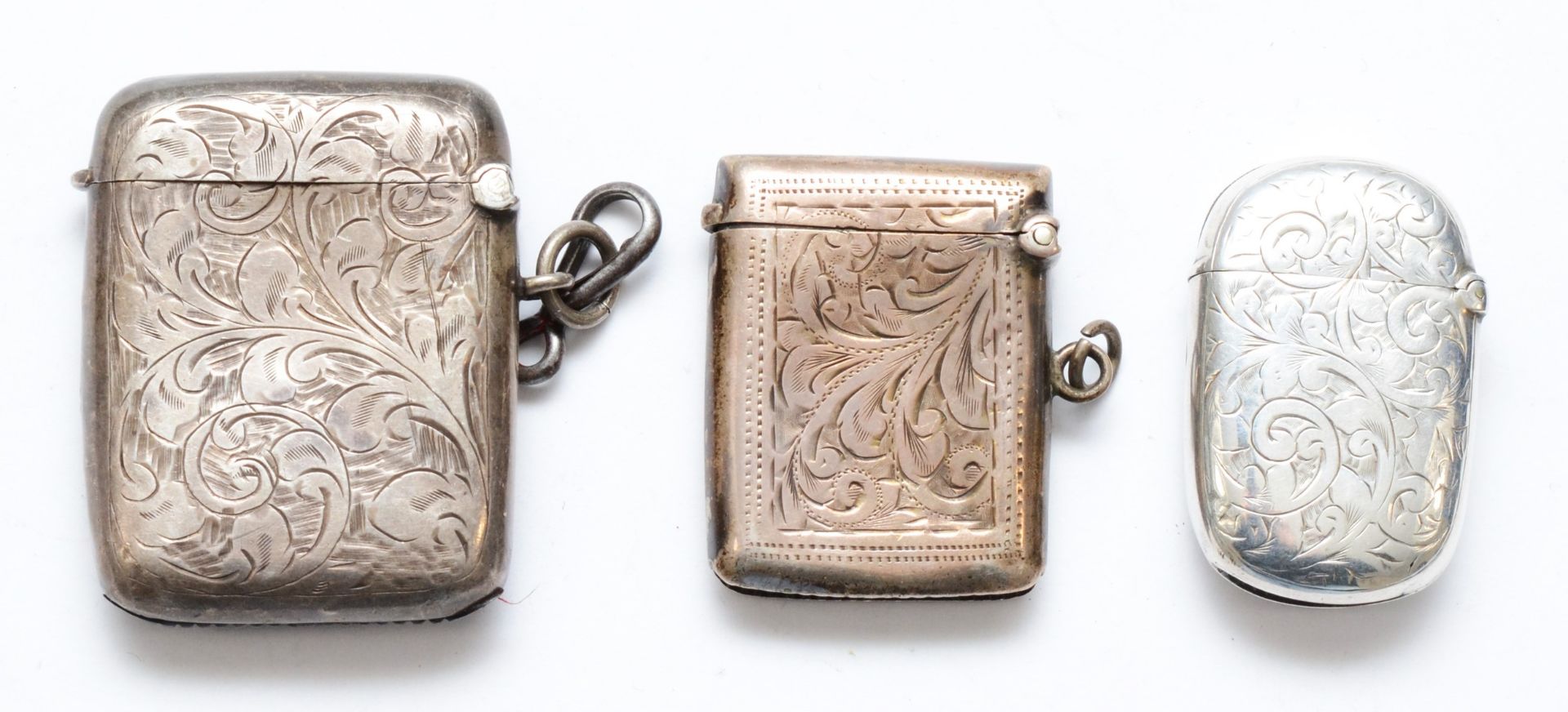 Three silver vesta cases, Birmingham 1896, 1911 and 1920, 58gms. - Image 2 of 3