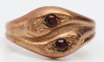 A vintage 9ct rose gold and garnet set double snake ring, S, 4.6gm