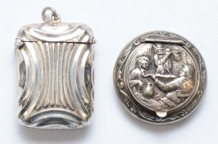 A Victorian electroplated vesta case and a circular silver pill box with Dutch sword mark.