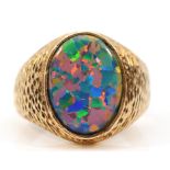 An unmarked 9ct gold and black opal doublet/triplet gentleman's signet ring, stone 18 x 14mm,