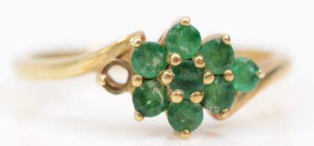 A 9ct gold and emerald cluster ring, one setting vacant, Q 1/2, 2.2gm
