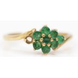 A 9ct gold and emerald cluster ring, one setting vacant, Q 1/2, 2.2gm