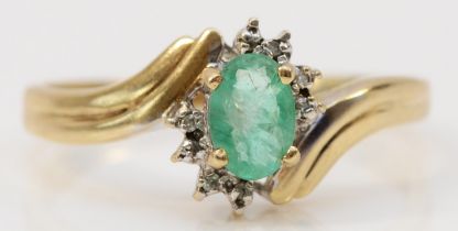 A 9ct gold emerald and single cut diamond cluster ring, O, 1.8gm.