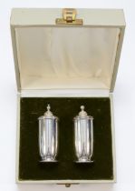 An Irish pair of salt and pepper, Dublin 1974, London import marks, 7.5cm, 67gms, case